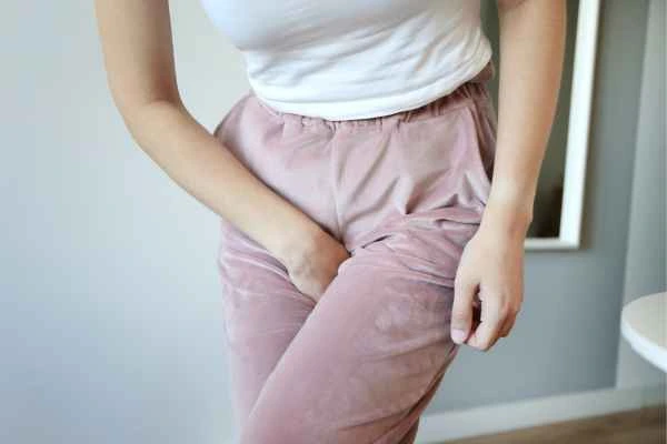 woman struggling with urine incontinence Warwickshire
